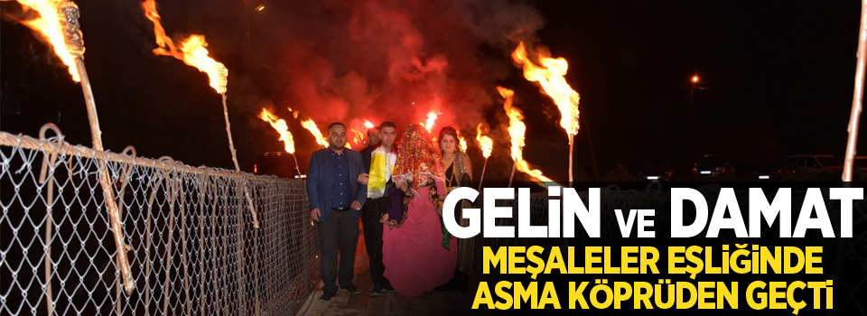 Gelin ve damat meşaleler eşliğinde asma köprüden geçti