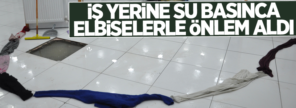 İş yerine su basınca elbiselerle önlem aldı